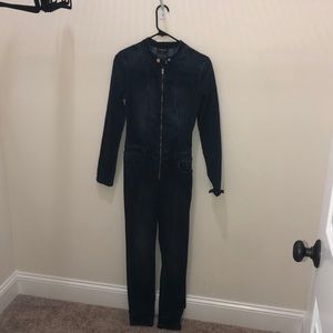 BEBE denim jumpsuit